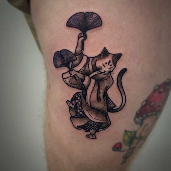 black and white tattoo of an asian cat wearing a kimono and holding fans