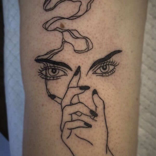 black line tattoo of a woman's eyes and hand that is holding a cigarette