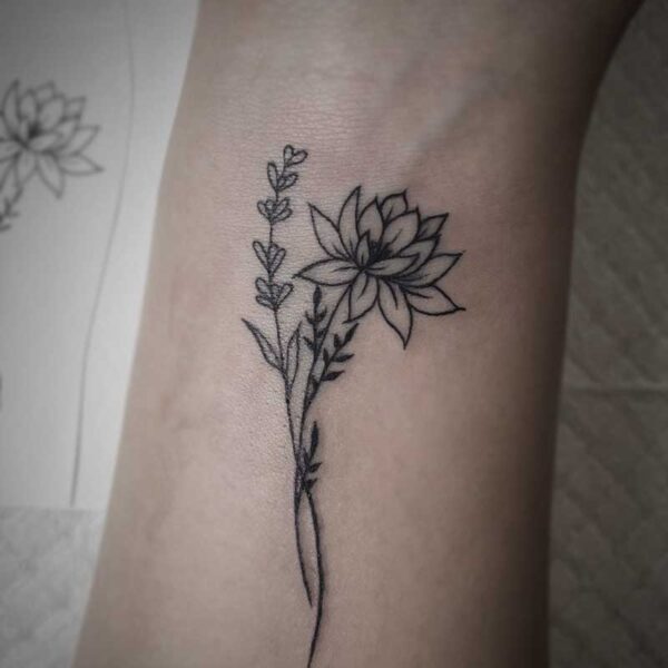 fine line tattoo of flowers