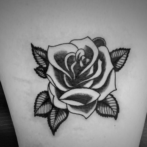 black and white old school tattoo of a rose