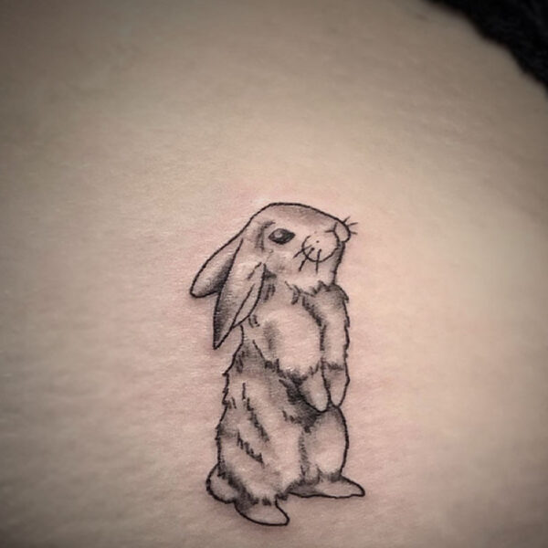 atticus tattoo, black and grey tattoo of a rabbit