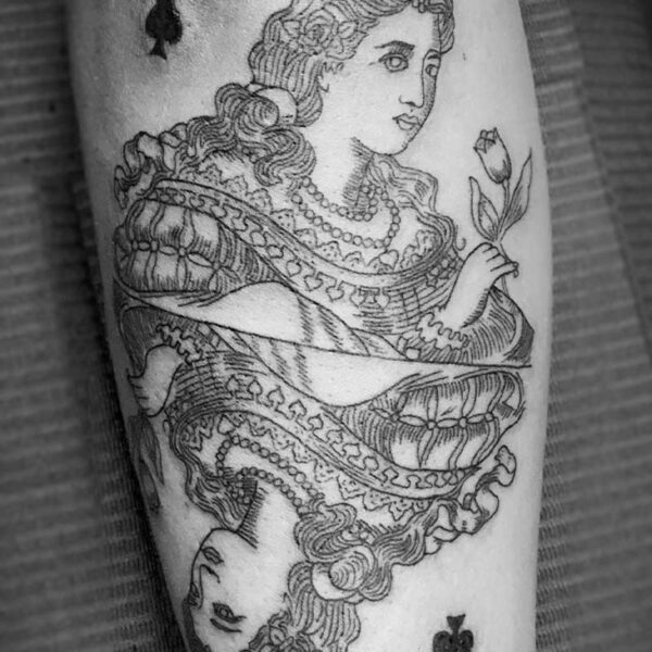 black and white tattoo of the queen of spades