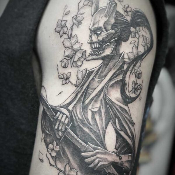 atticus tattoo, black and grey tattoo of a skeleton samurai with cherry blossoms