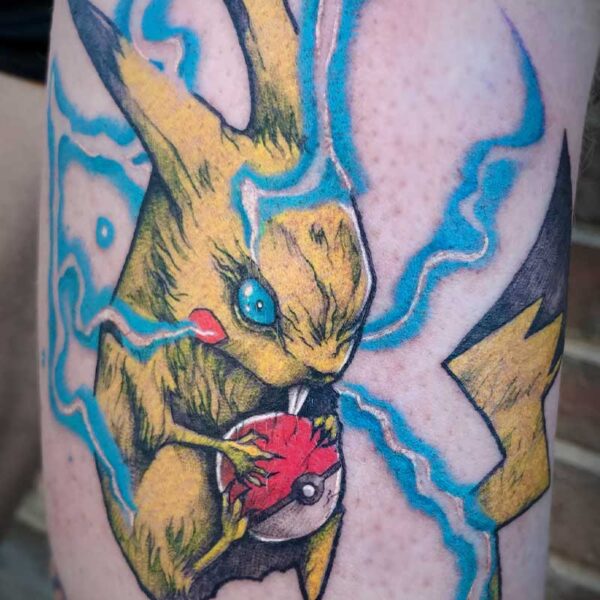 atticus tattoo, coloured tattoo of a stylized pikachu holding a pokeball and lightning shooting out of it