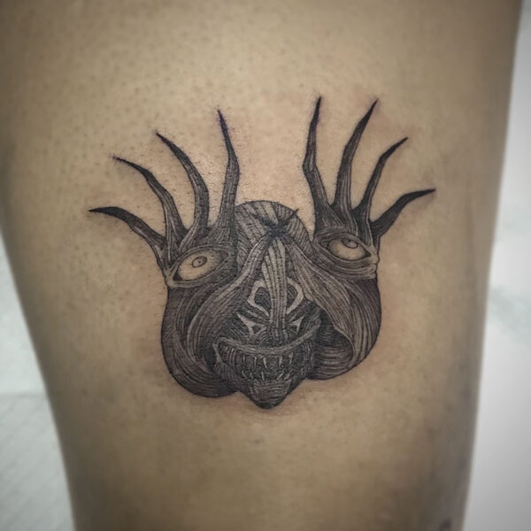 atticus tattoo, black and grey tattoo of a monster with eyeballs on its hands