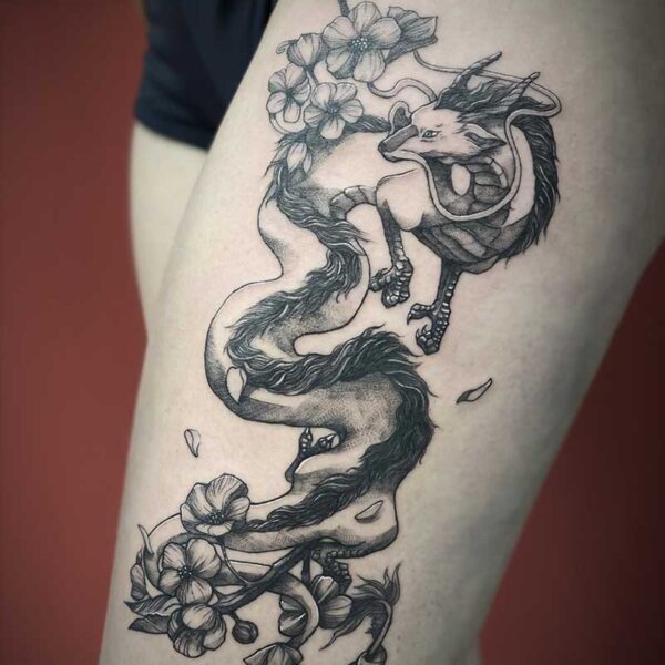 atticus tattoo, black and grey tattoo of the dragon from Spirited Away