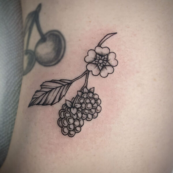 atticus tattoo, fine line tattoo of blueberries