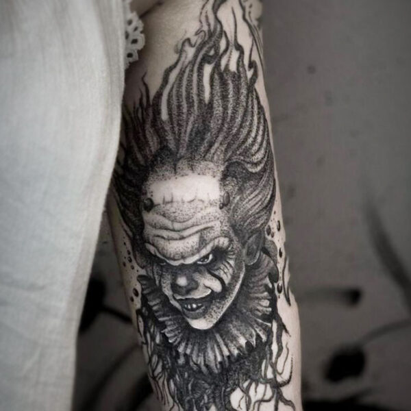 atticus tattoo, black and grey tattoo of Pennywise