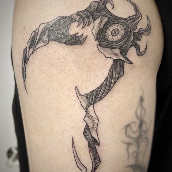 atticus tattoo, black and grey tattoo of monster in the shape of a scythe