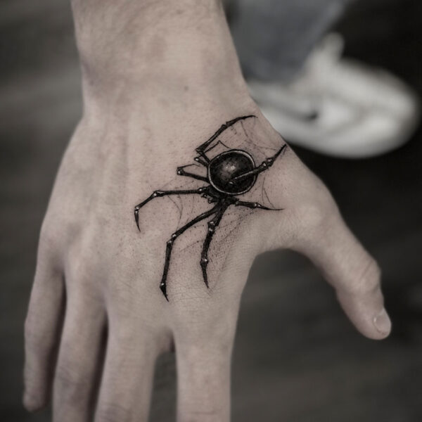 atticus tattoo, black and white realism tattoo of a spider
