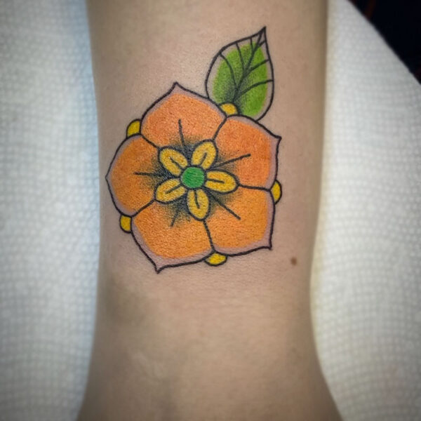 atticus tattoo, bright orange flower tattoo