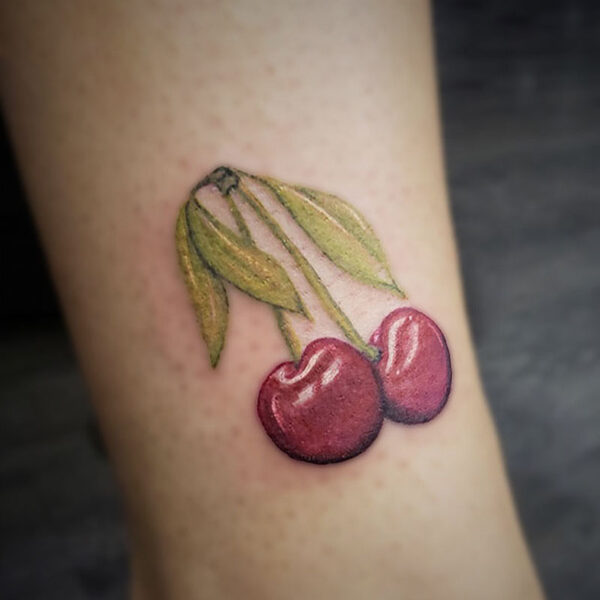 atticus tattoo, coloured tattoo of a pair of cherries