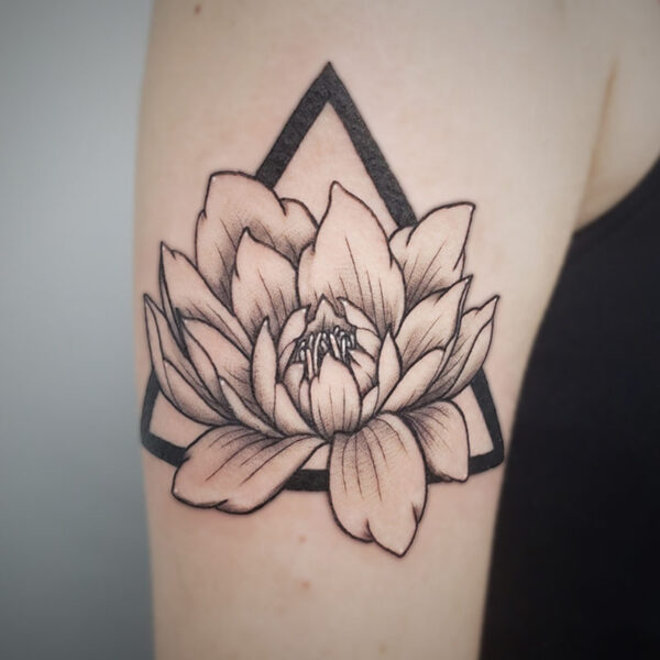 atticus tattoo, fine line tattoo of a lotus and triangle