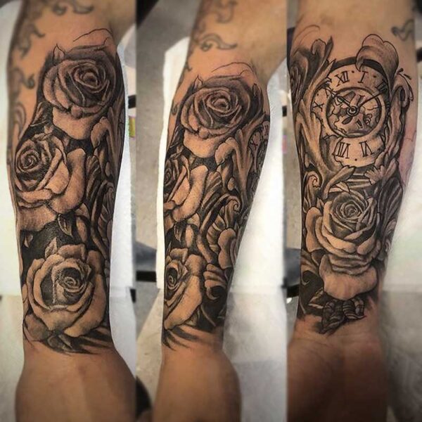 atticus tattoo, black and white tattoo of roses and a clock