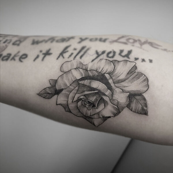 atticus tattoo, fine line tattoo of a rose