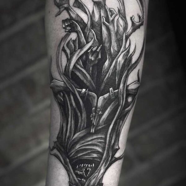 atticus tattoo, black and grey horror tattoo of a skeleton king and arms reaching towards the sky