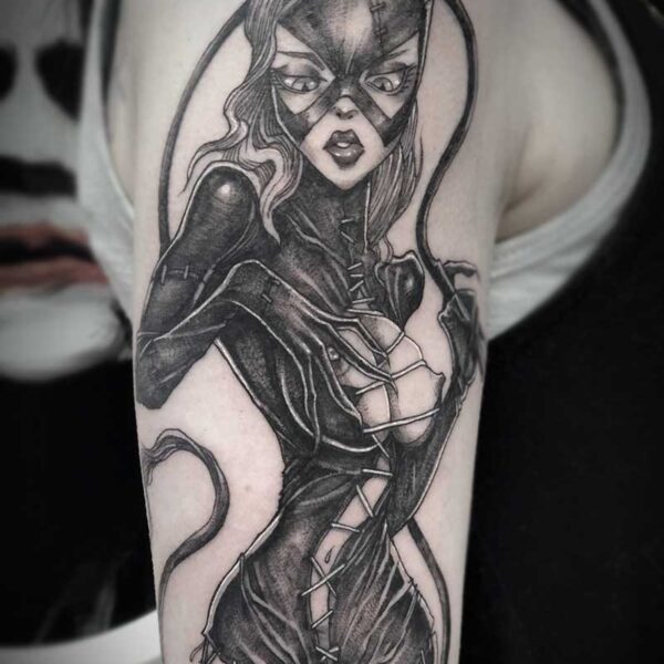 atticus tattoo, black and grey tattoo of cat woman