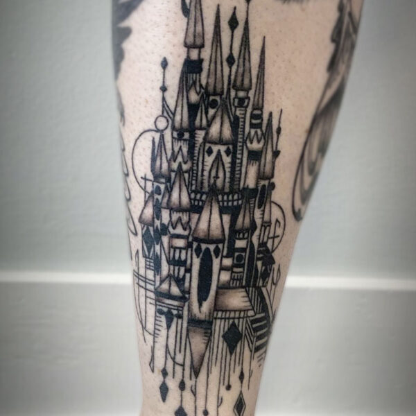 atticus tattoo, black and grey tattoo of a stylized castle