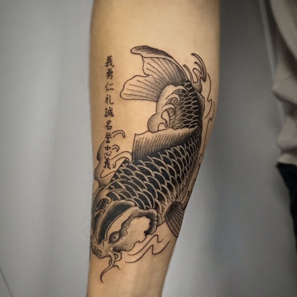 atticus tattoo, traditional Chinese style tattoo of a koi fish