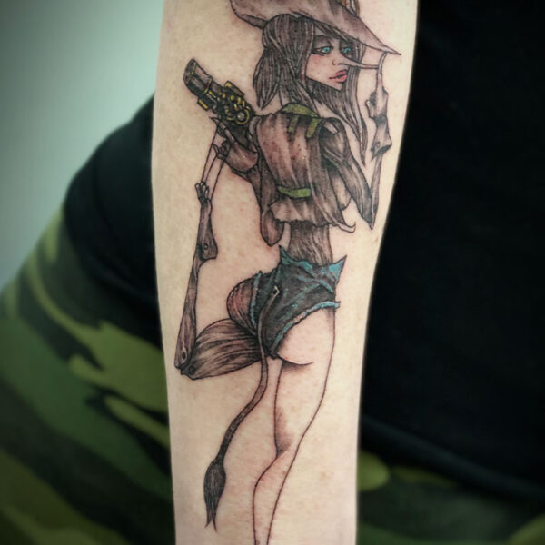 atticus tattoo, coloured tattoo of a girl version of Pinocchio with donkey ears and tail
