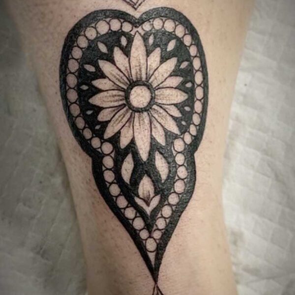 atticus tattoo, black and grey tattoo of a henna style tattoo