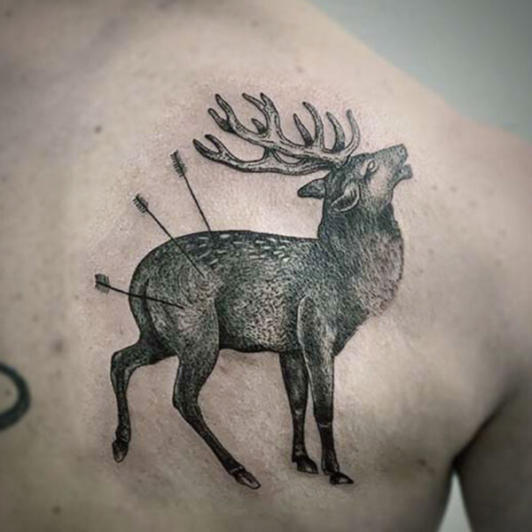 atticus tattoo, black and grey tattoo of an elk with three arrows in its back