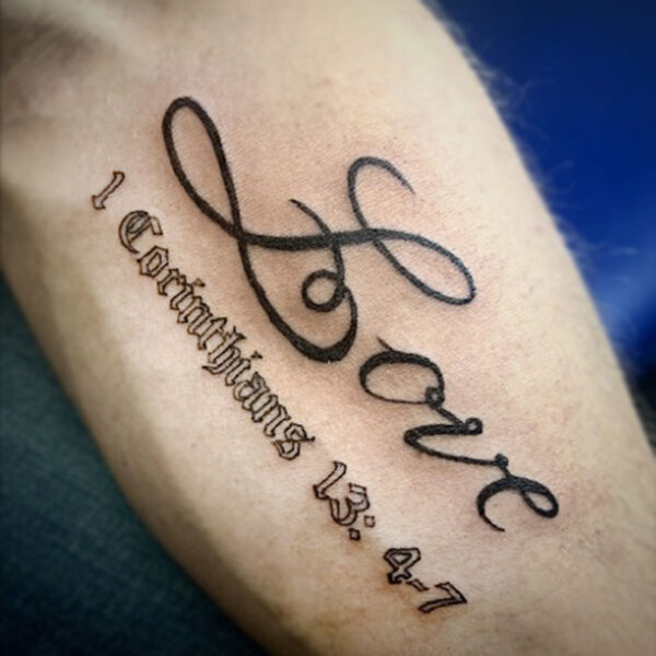 atticus tattoo, font tattoo of the word "love" and a bible page