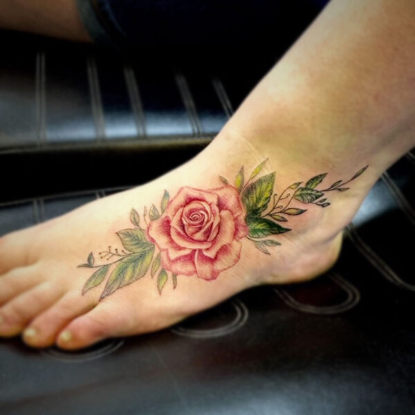 atticus tattoo, coloured tattoo of a rose and foliage