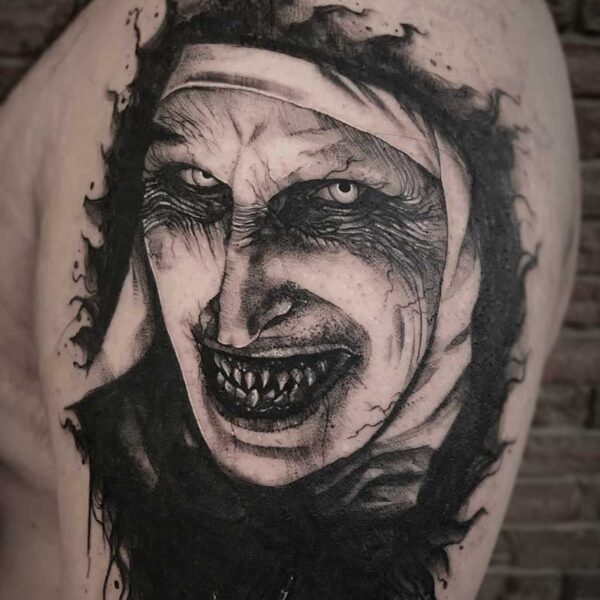 atticus tattoo, black and grey tattoo of the nun from the Conjuring
