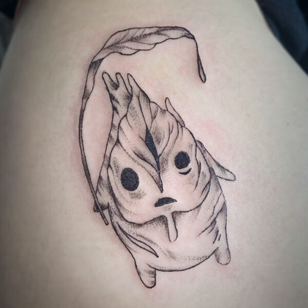 atticus tattoo, fine line tattoo of a little leaf creature holding a leaf as an umbrella