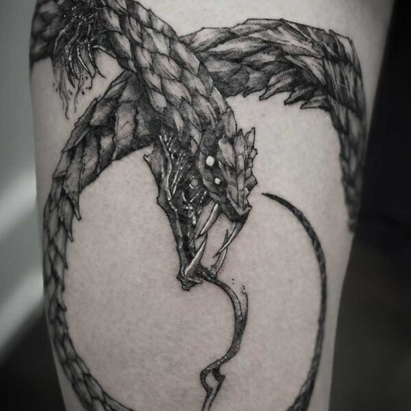 atticus tattoo, black and grey tattoo of a spiky snake, monster