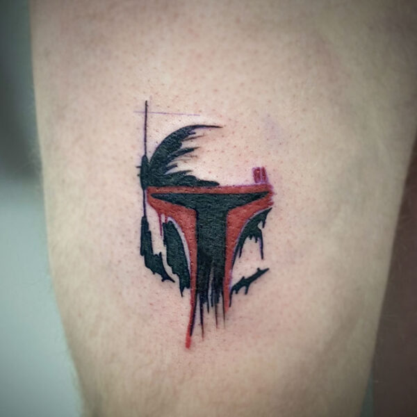 atticus tattoo, red and black tattoo of the Mandalorian's mask