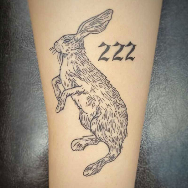 atticus tattoo, fine line tattoo of a rabbit and the number 222