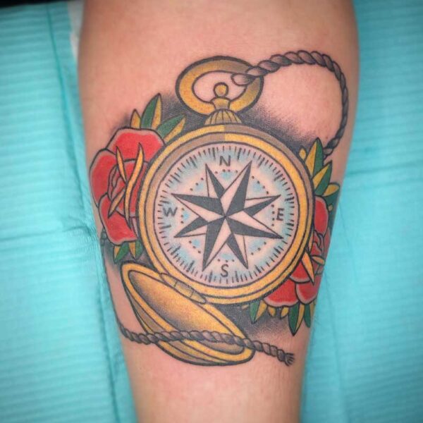 atticus tattoo, coloured neotraditional tattoo of a stop watch with roses