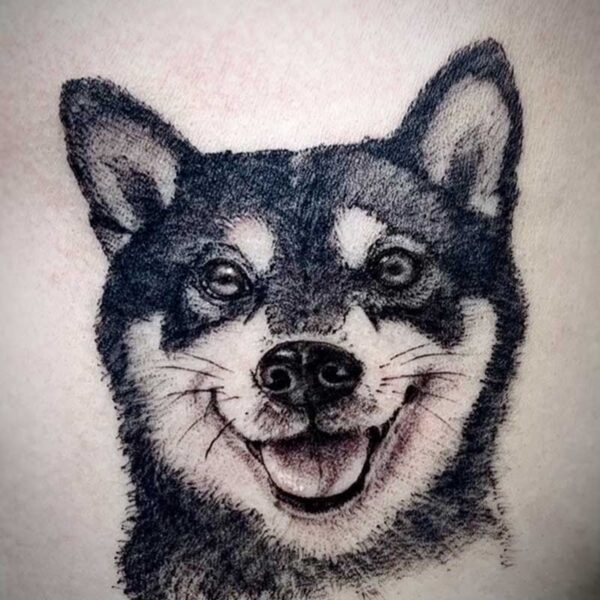 atticus tattoo, black and white tattoo of a black shiba inu dog