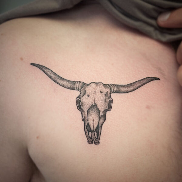 atticus tattoo, black and grey tattoo of a Texas longhorn skull