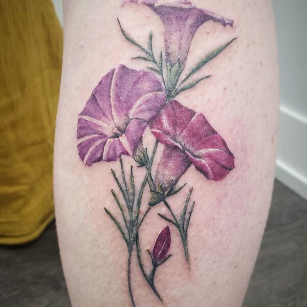 atticus tattoo, coloured tattoo of flowers