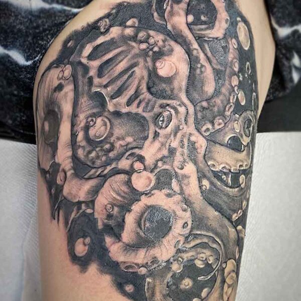 atticus tattoo, black and grey tattoo of an octopus with bubbles