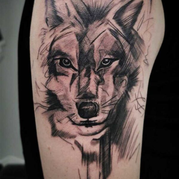 atticus tattoo, black and grey tattoo of a wolf that looks like its been sketched