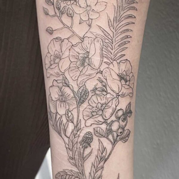 atticus tattoo, fine line tattoo of flowers, berries and foliage