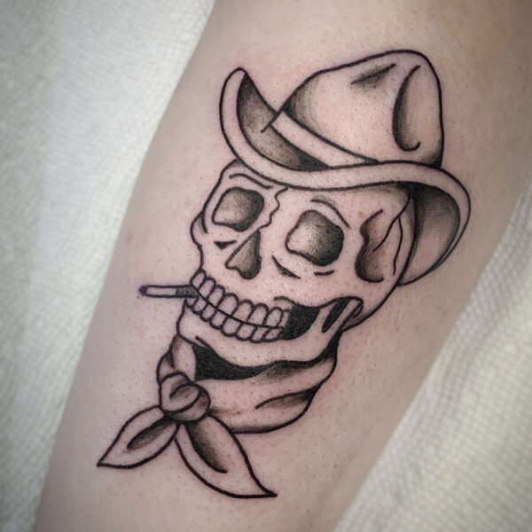 atticus tattoo, traditional tattoo of a skull cowboy