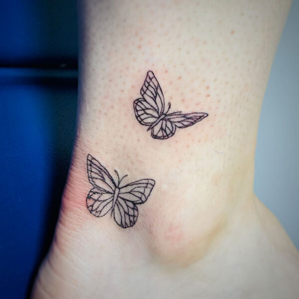 atticus tattoo, fine line tattoo of butterflies