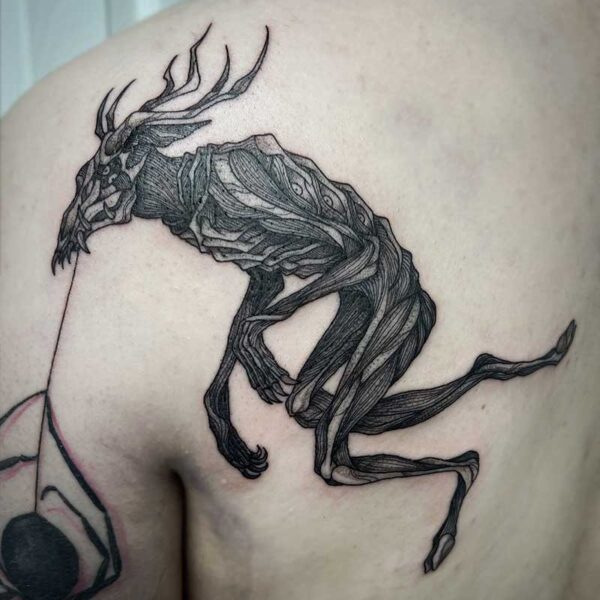 atticus tattoo, black and grey tattoo of a Wendigo
