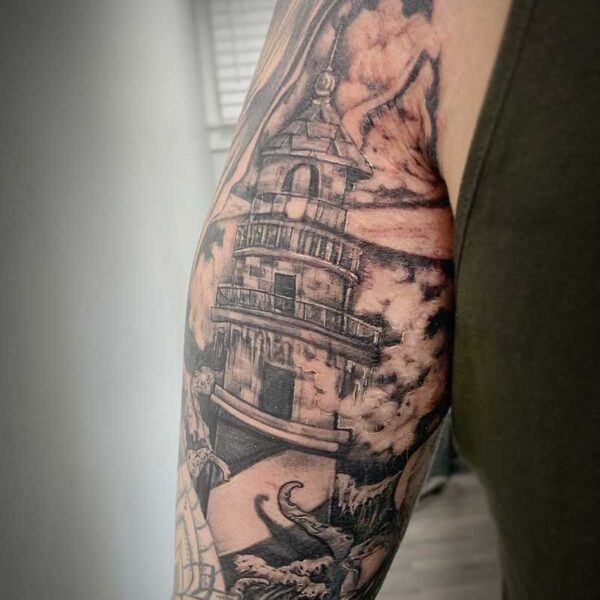atticus tattoo, black and white realism tattoo of a lighthouse