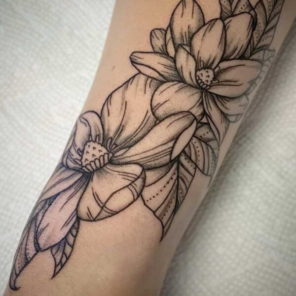 atticus tattoo, fine line tattoo of two flowers