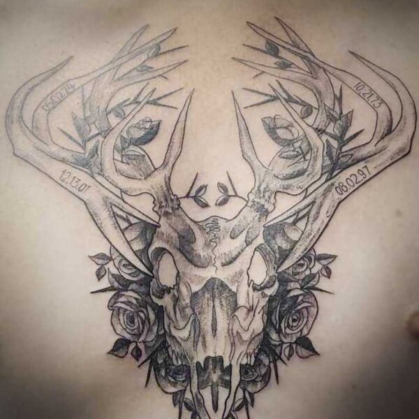 atticus tattoo, black and grey tattoo of a deer skull with roses