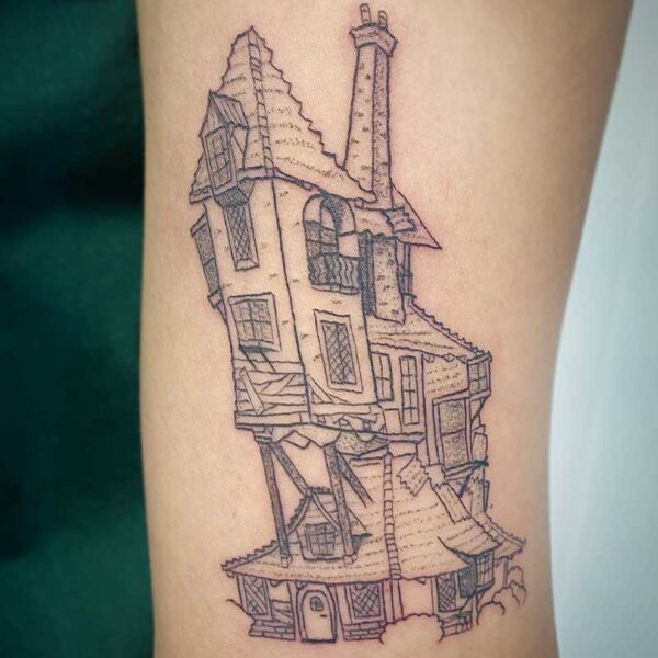 atticus tattoo, fine line tattoo of the Weasley's home from Harry potter