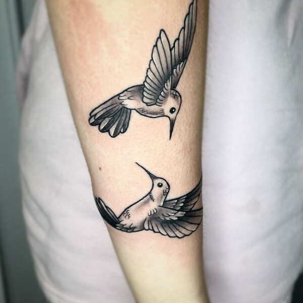 atticus tattoo, black and white tattoo of two humming birds