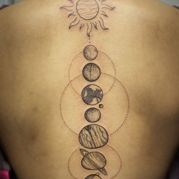 atticus tattoo, black and grey tattoo of the sun and planets