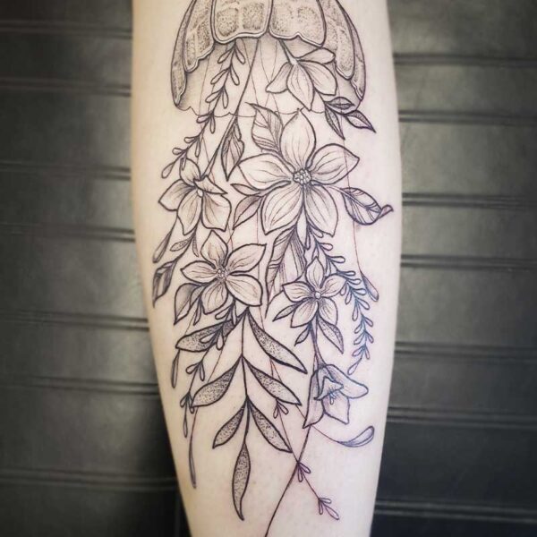 atticus tattoo, fine line tattoo of a jellyfish made out of flowers